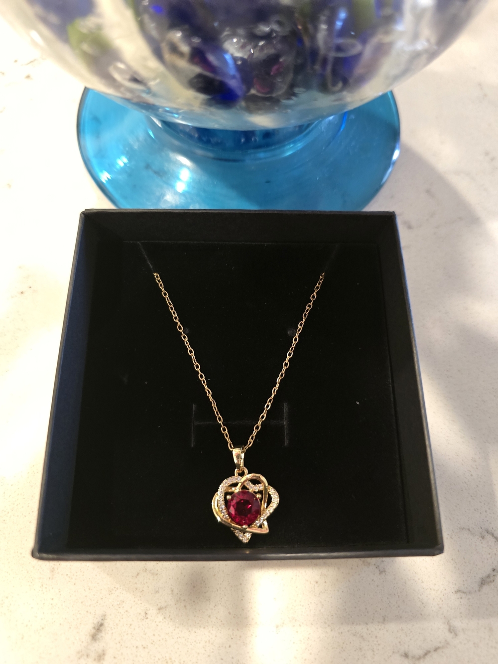 Gold Heart Pendant Necklace with Red Gem